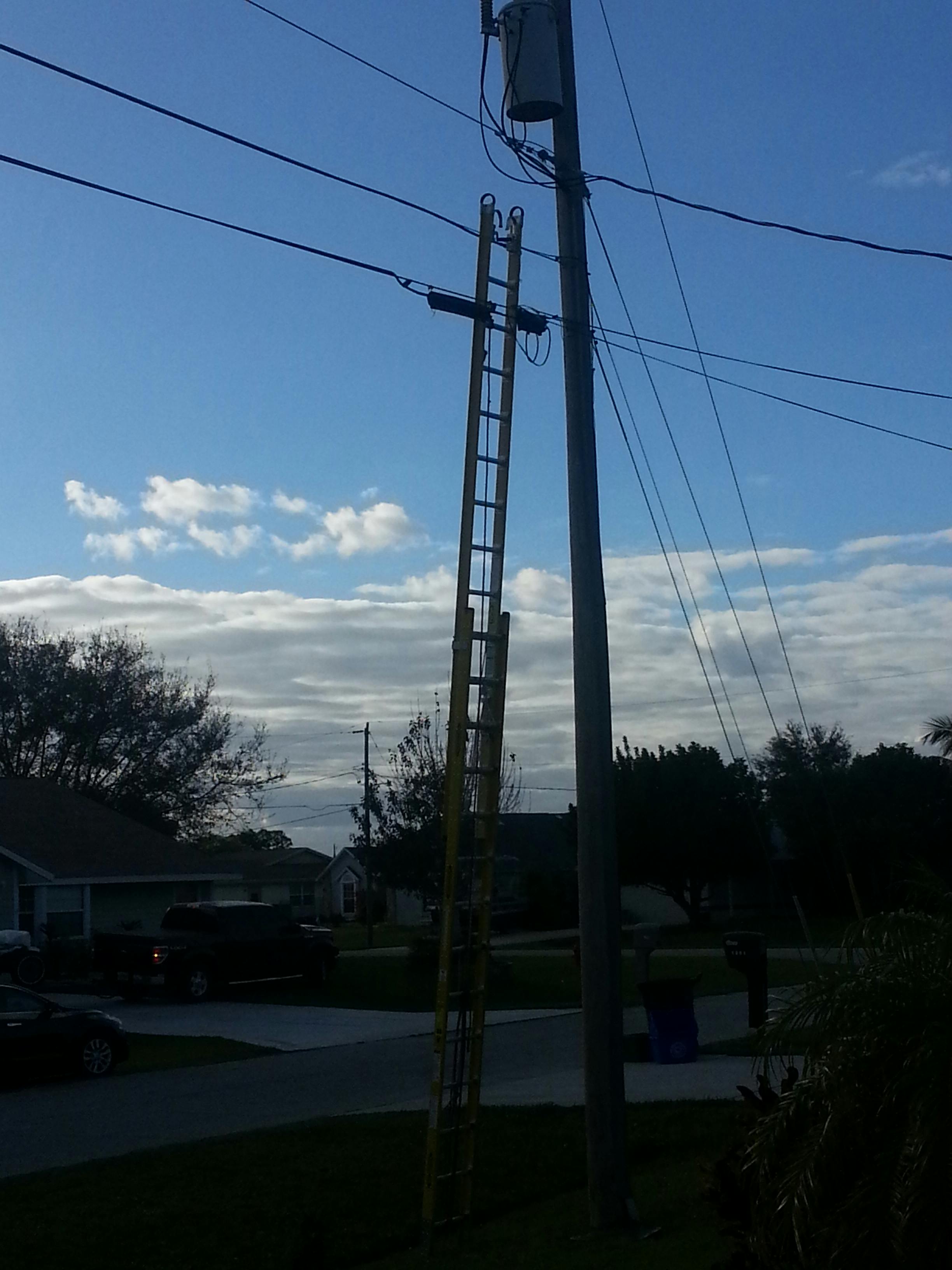 Free stock photo of extension ladder by powerlines