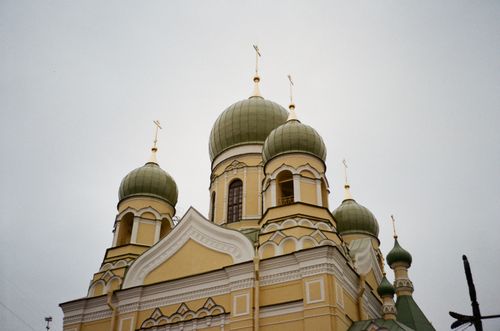 Free Photograph of an Orthodox church featuring stunning green domes and ornate architectural details. Stock Photo