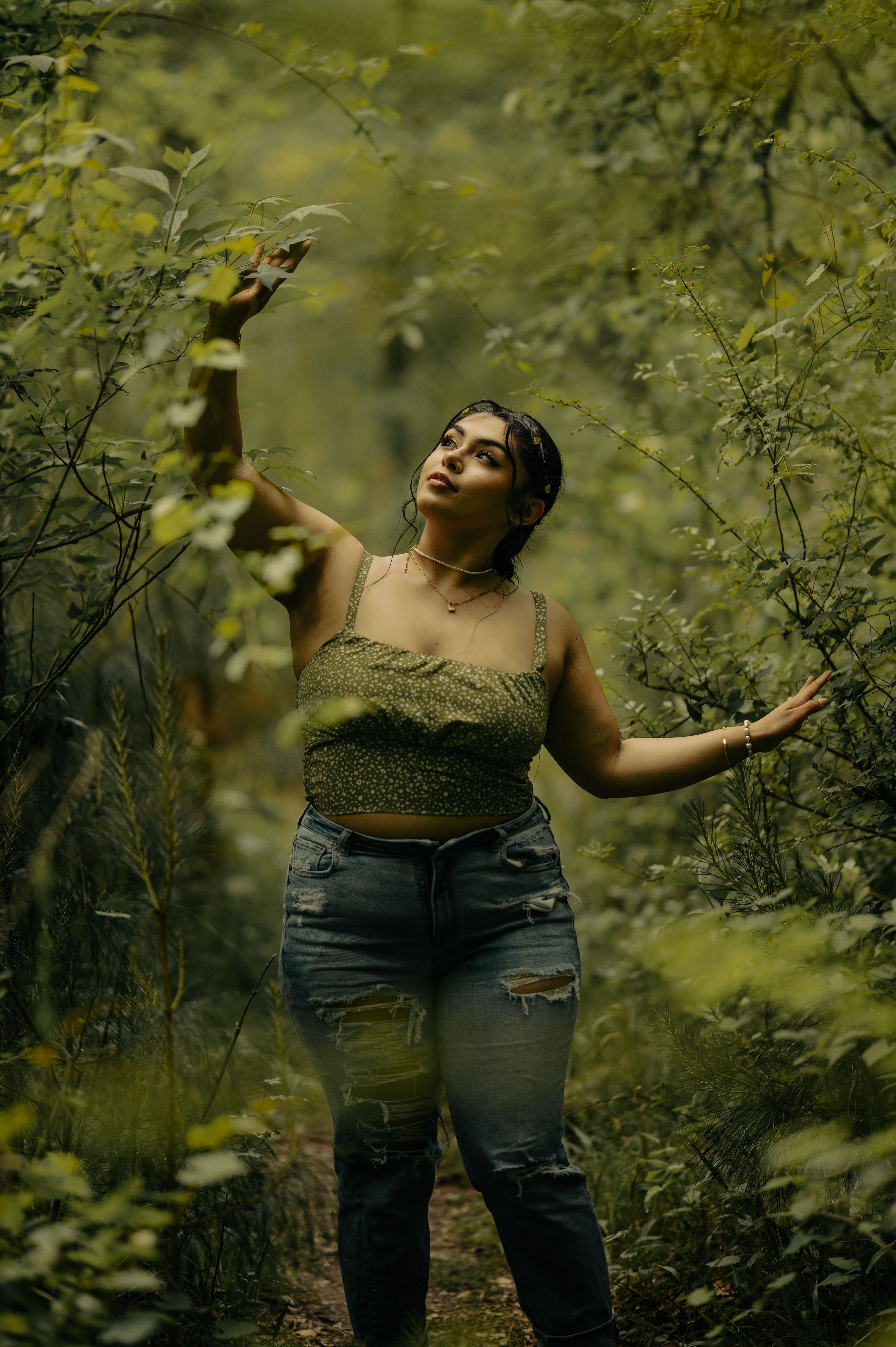 Woman Posing Among Shrubs in a Forest · Free Stock Photo