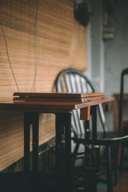 Vacant Black Chair Near Brown Wooden Table