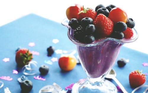 Free Strawberries and Blueberries on Footed Cup Stock Photo