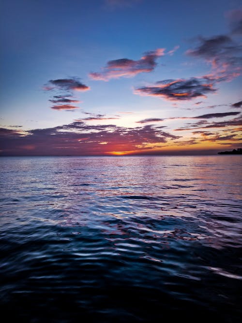 Безкоштовне стокове фото на тему «skyscape, берег моря, вечір»