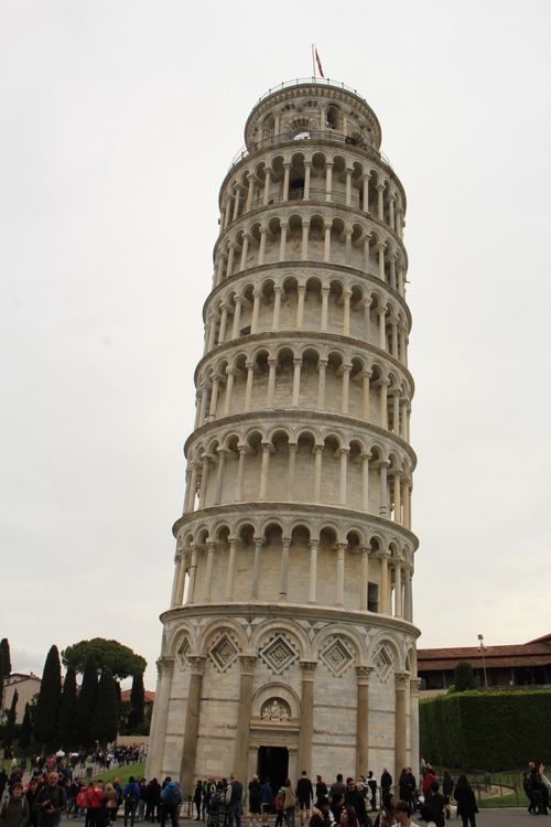 Free A detailed view of the iconic Leaning Tower of Pisa, showcasing its unique tilt and architectural detail. Stock Photo