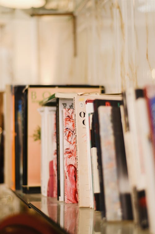 Selective Focus Photography Of Assorted Books