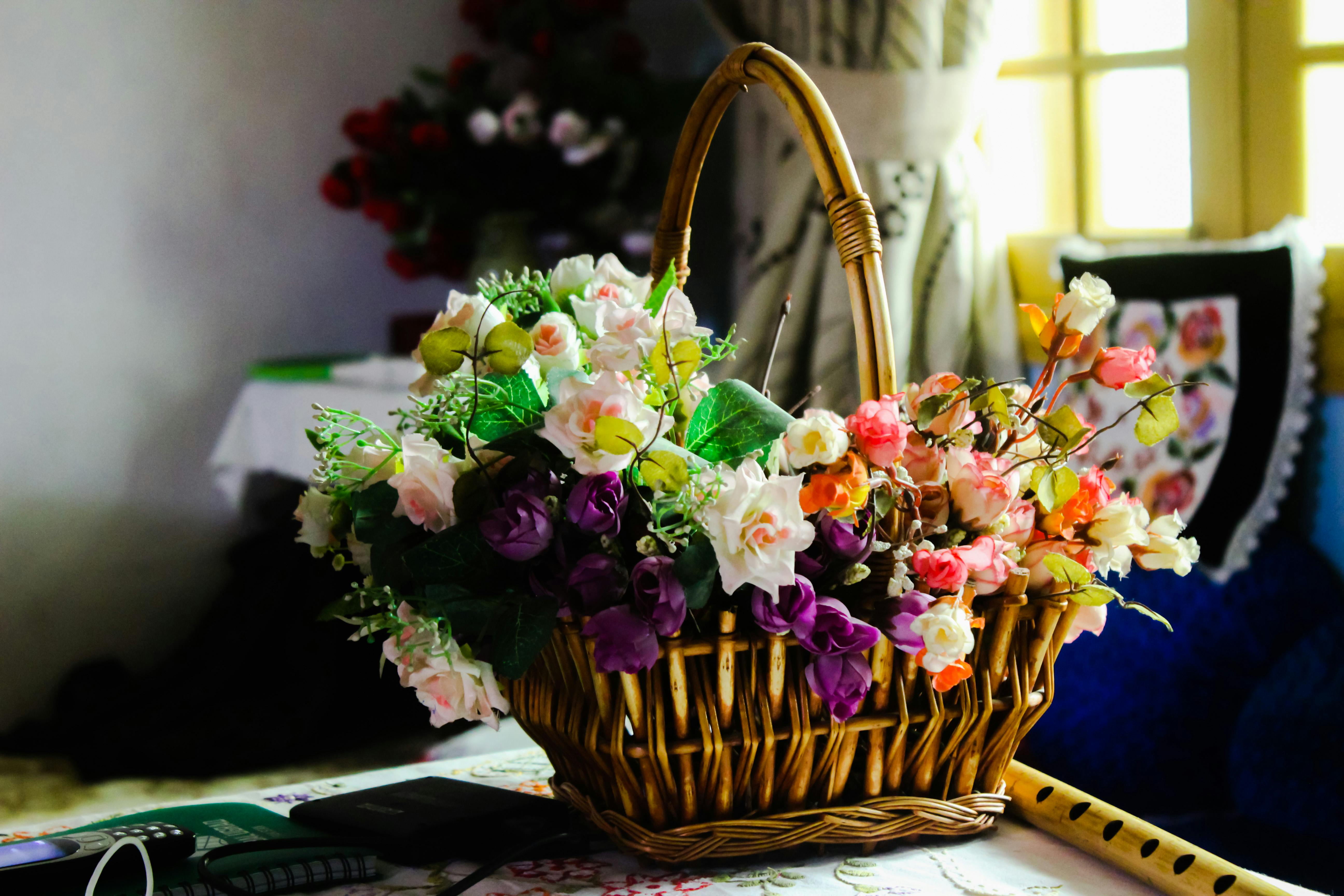 Free stock photo of artificial flowers, basket, basket of flowers