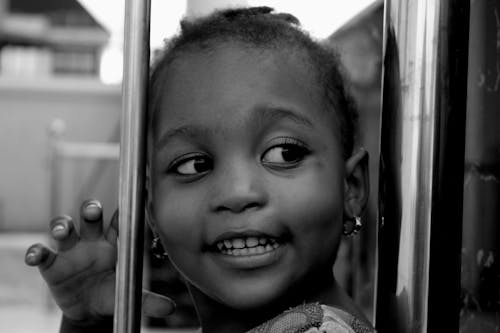 Monochrome Photo of Girl Smiling