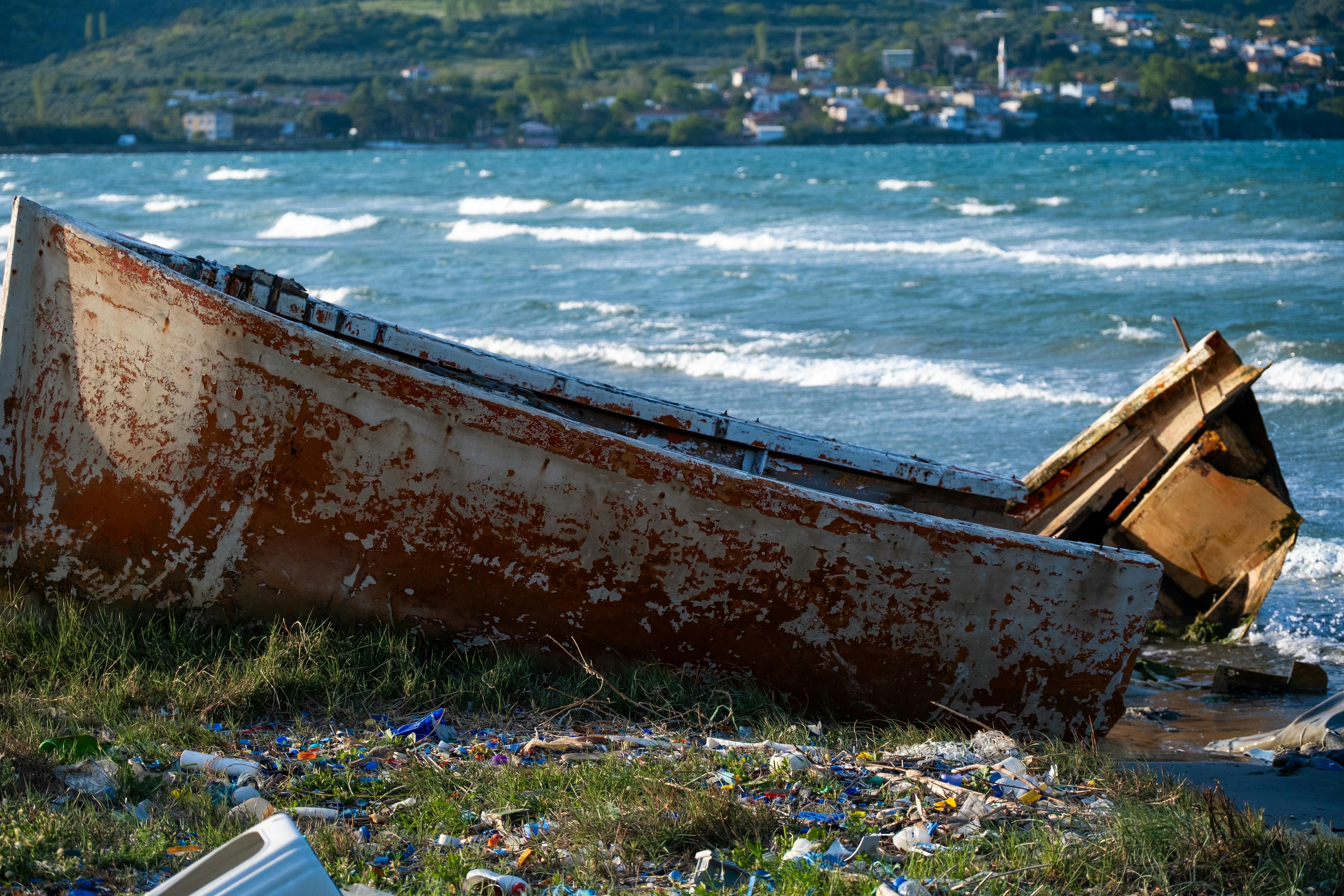 abandoned boat on shore