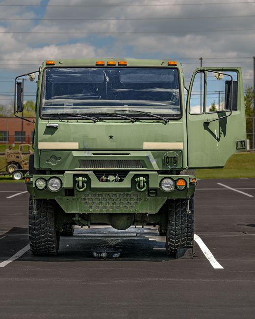 U.S. Army Veteran navigating a rugged overland trail in a modified 4x4 vehicle, demonstrating military skills in a new context