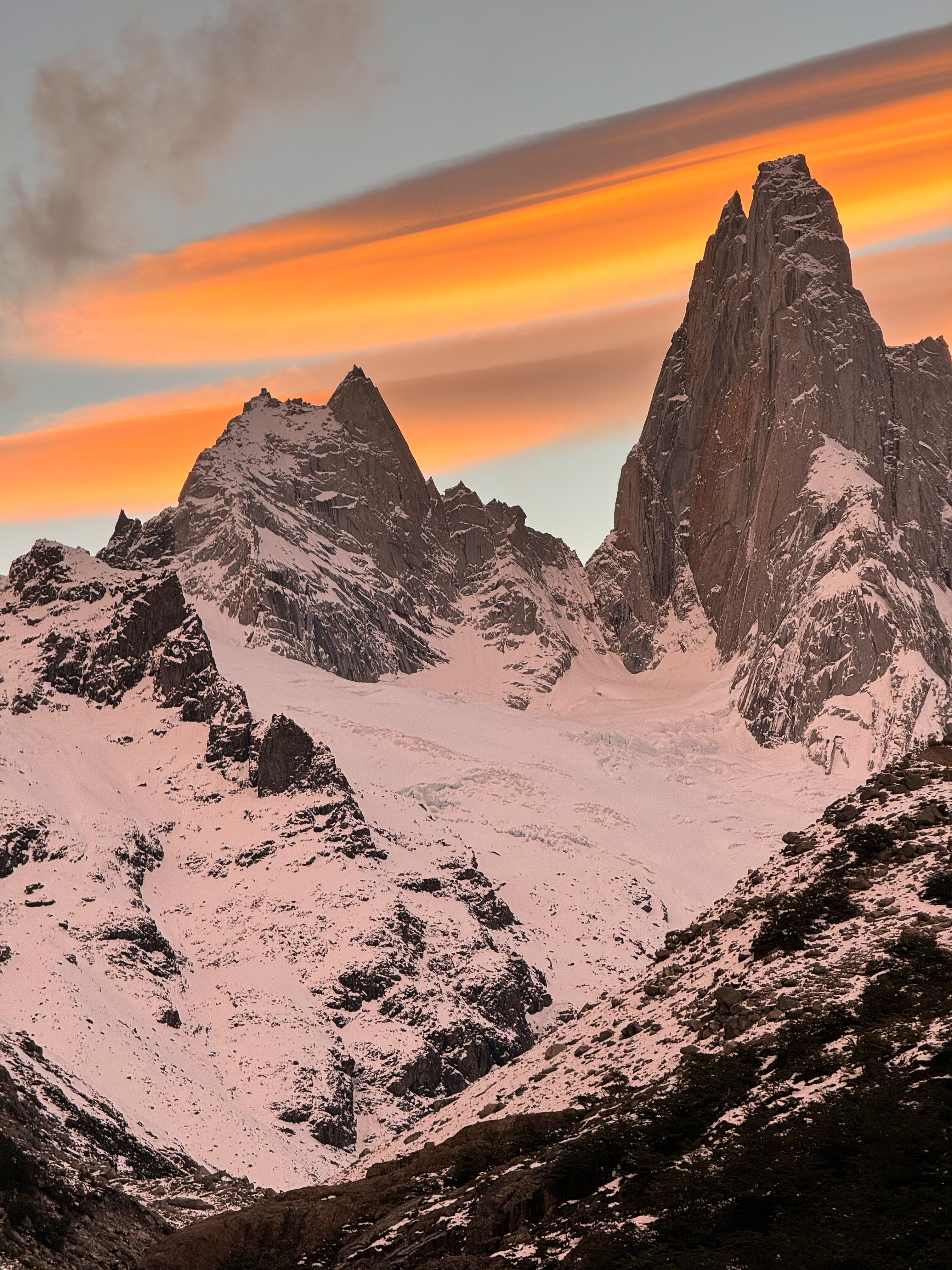 Stunning sunrise view of Mount Fitz Roy covered in snow, located in Patagonia, Argentina.