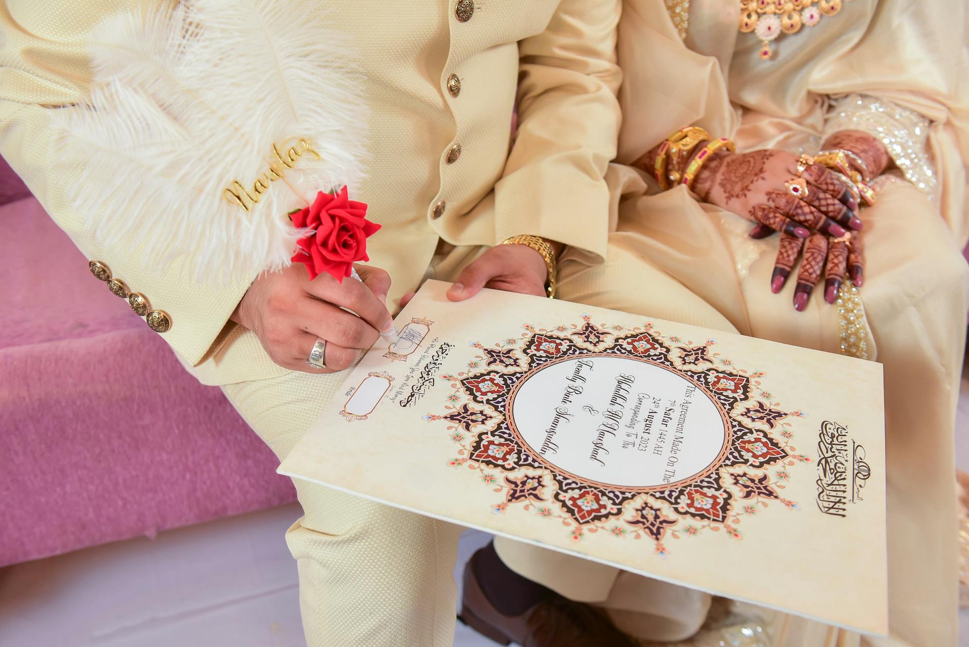 Couple Signing Wedding Certificate