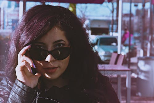 Free Portrait Photo of Woman Posing in Black Sunglasses Stock Photo