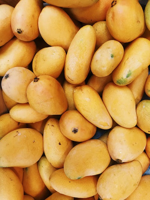 Kostnadsfria Kostnadsfri bild av frukt, gul, gul bakgrund Stock foto