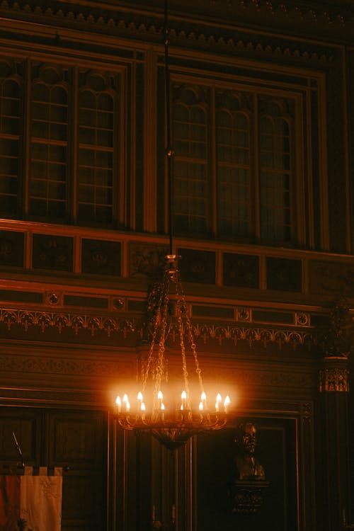 A chandelier hanging from the ceiling of a building