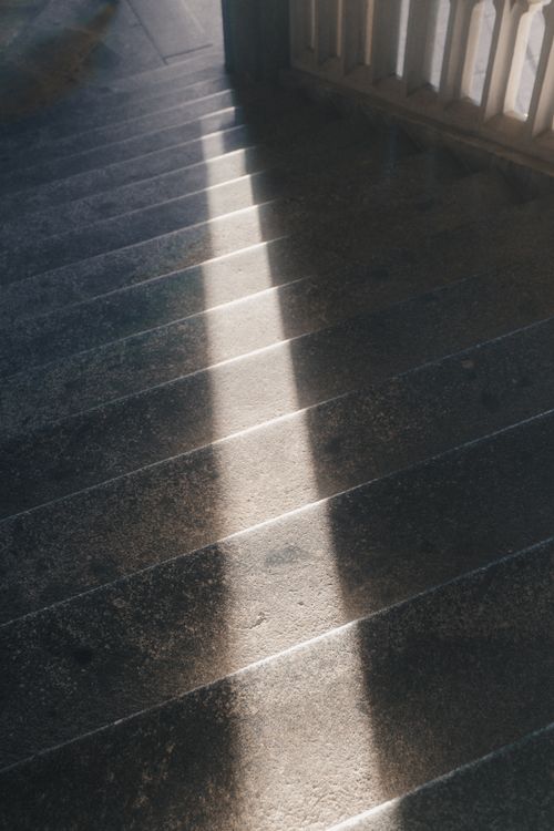 Free A dramatic sunlight casting shadows on a concrete staircase, Zittau, Germany. Stock Photo