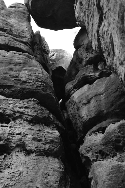 A black and white photo of a rock formation