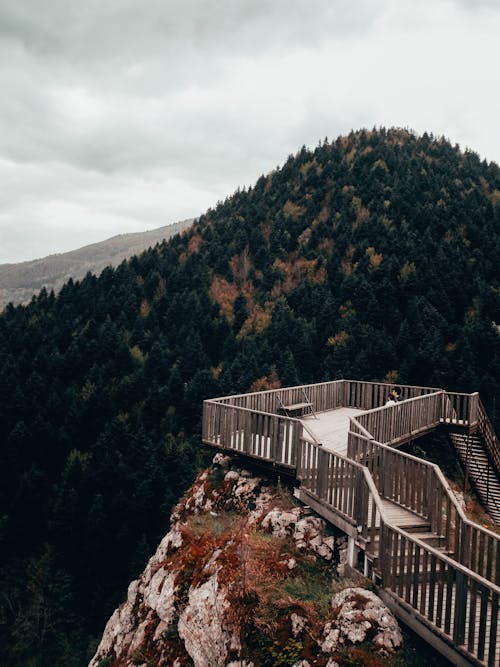 A wooden walkway on top of a mountain