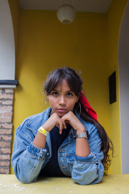 Photo of Woman Wearing Denim Jacket