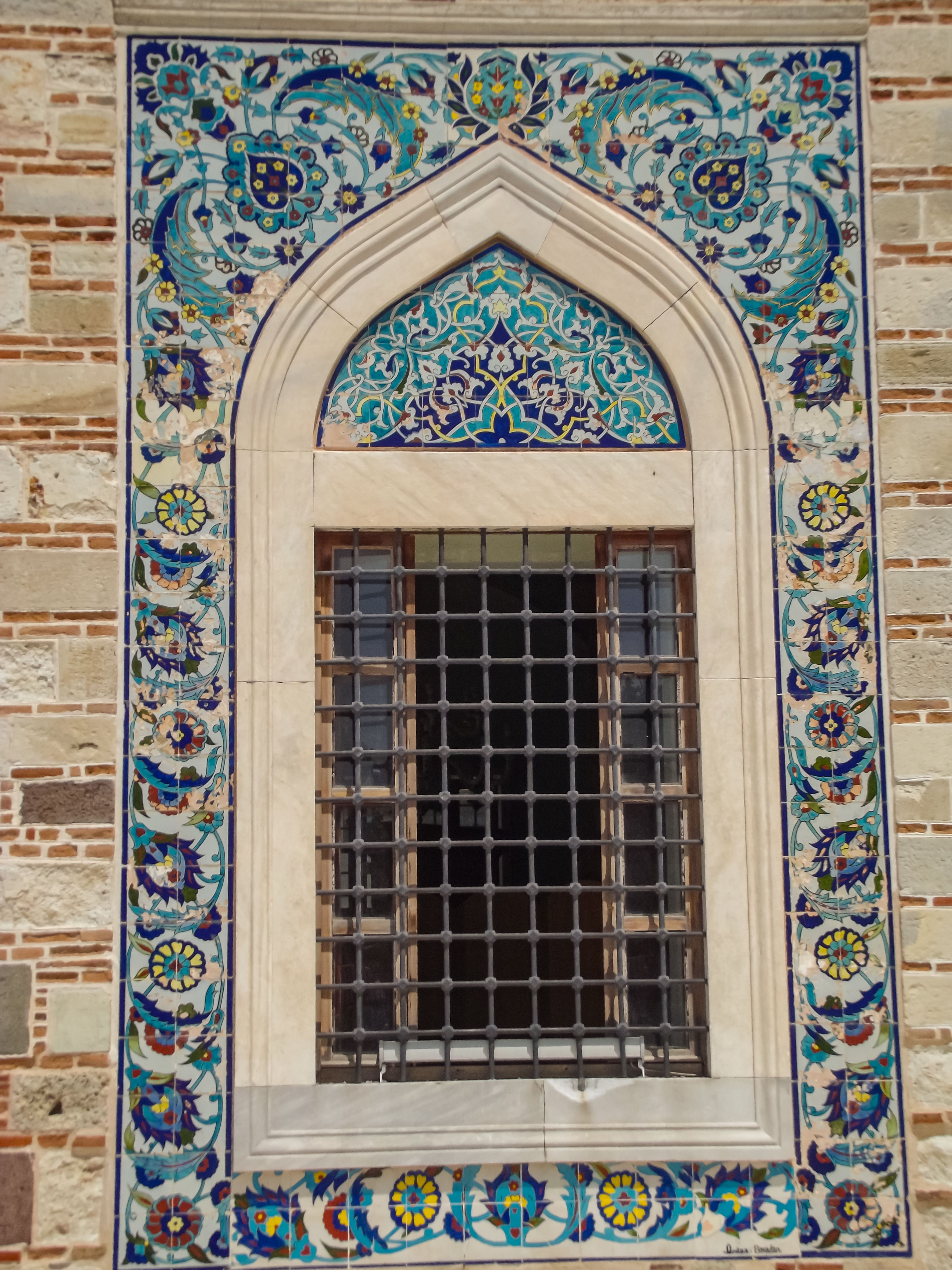 A window with a decorative tile pattern on it · Free Stock Photo