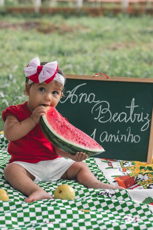 Free Photo of Girl Eating Watermelon Stock Photo
