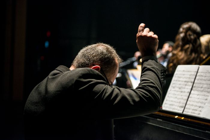 Pianist performing with a vocal microphone, Jacob Yavin on Pexels