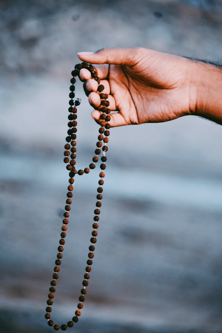 Bead Necklace Being Held