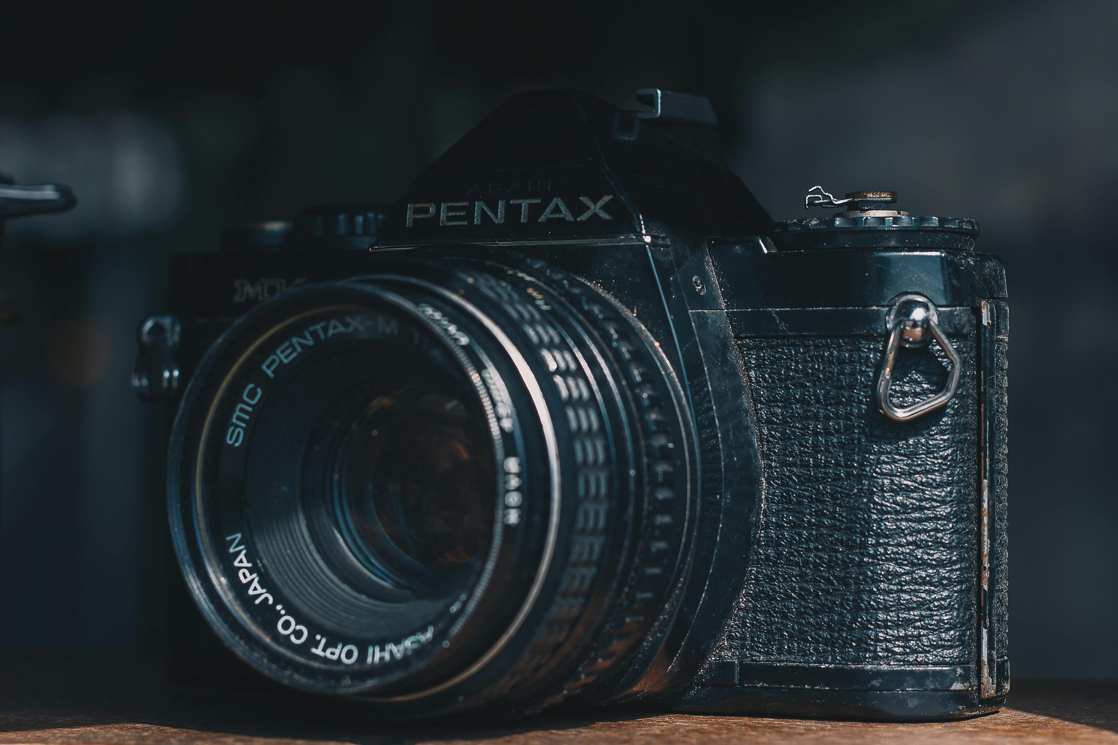 Black Pentax Camera In Selective Focus Photography · Free Stock Photo