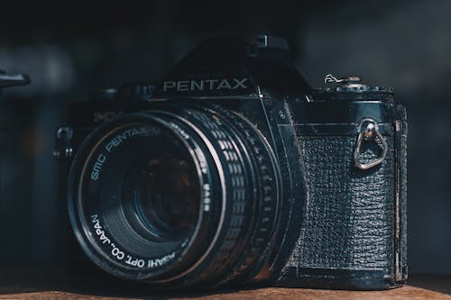 Black Pentax Camera in Selective Focus Photography