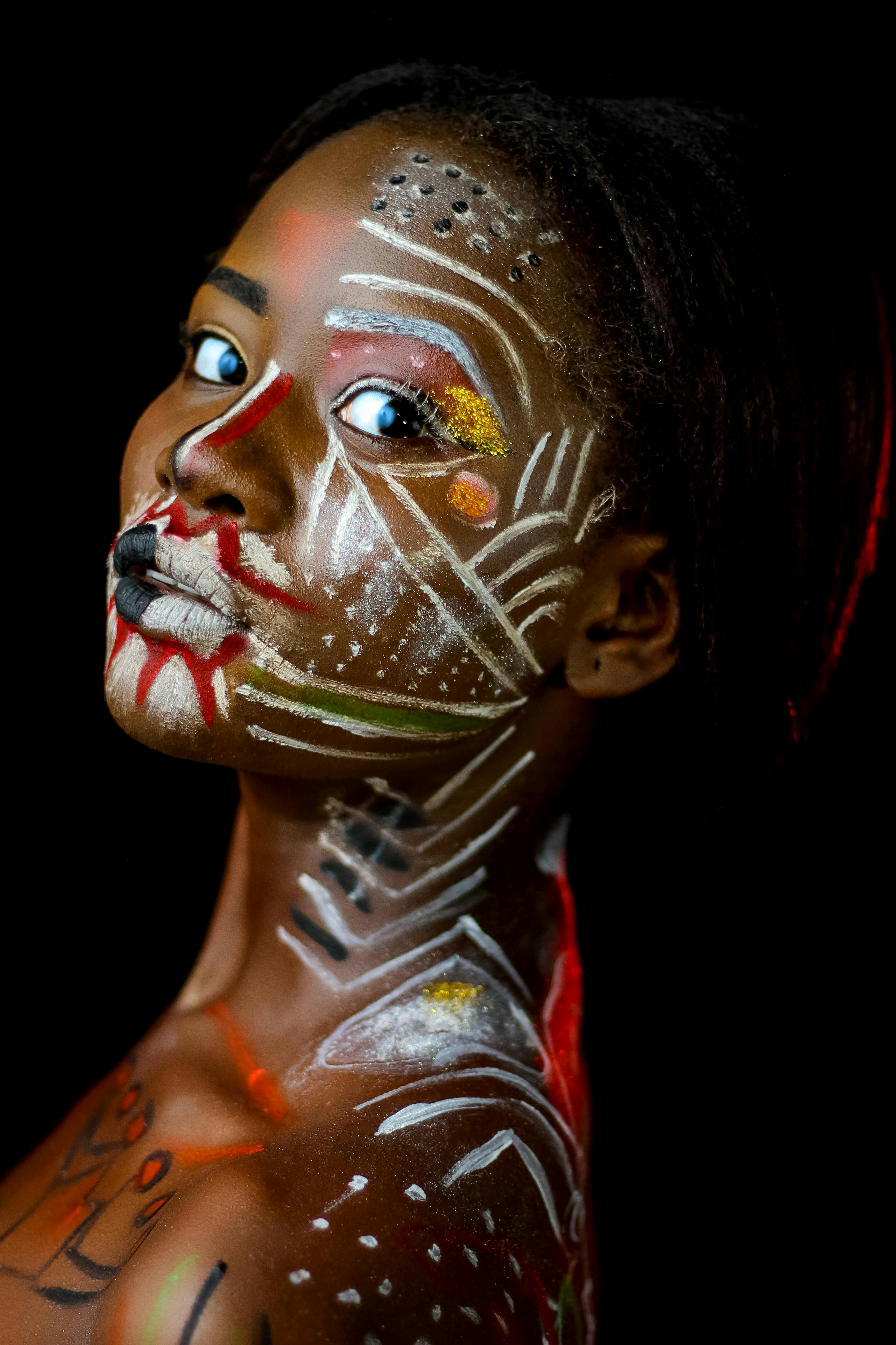 Woman with Face and Body Paint · Free Stock Photo