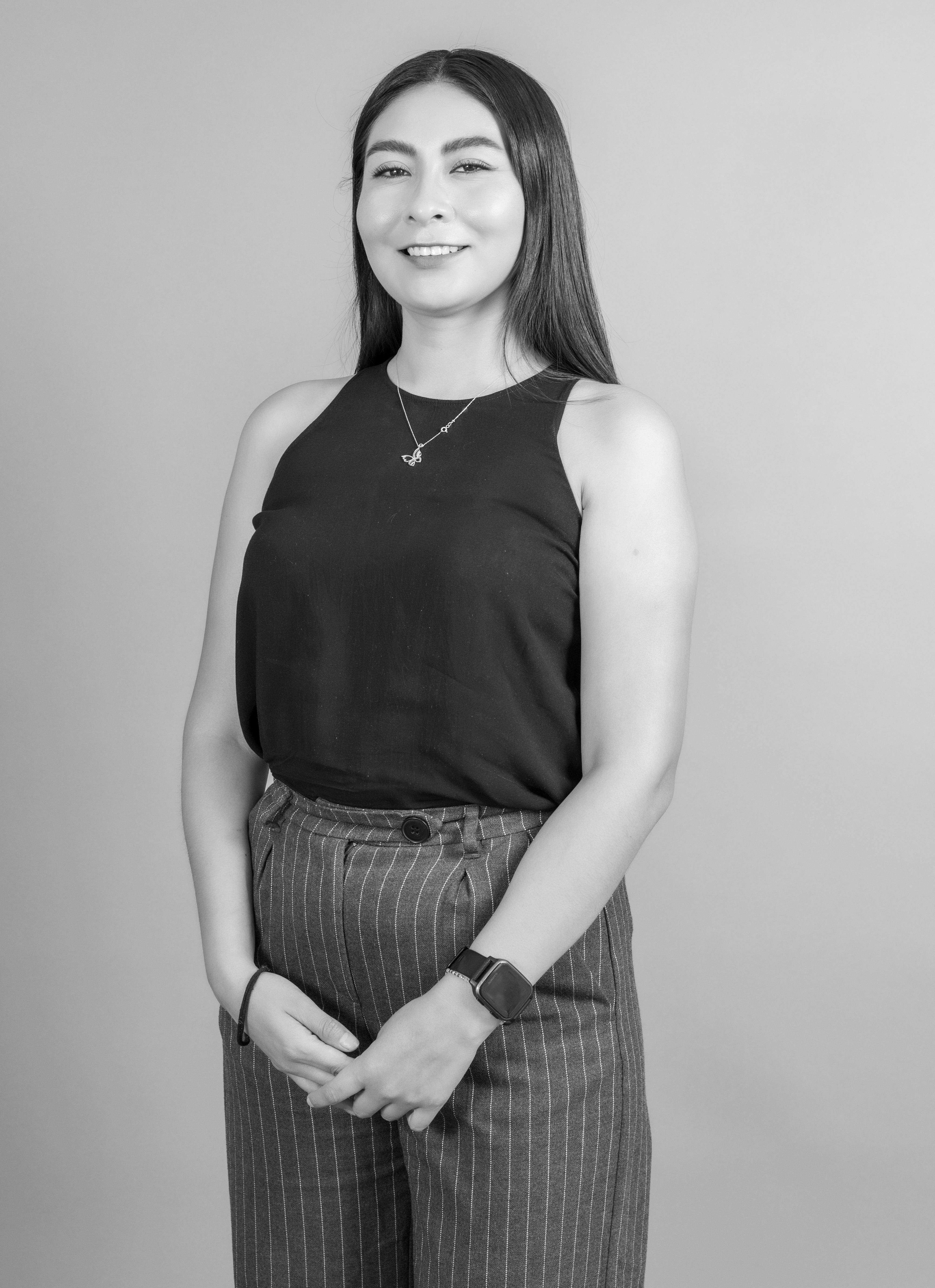 Chic portrait of a smiling woman in Ciudad de México, embodying modern elegance and style.