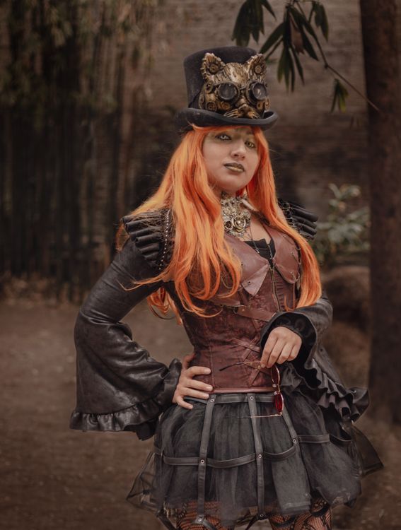 Redhead Model in Steampunk Style Dress  Free Stock Photo
