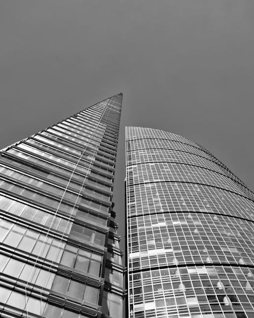 Black and white photo of two tall buildings