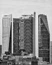 Black and white photo of tall buildings in the city