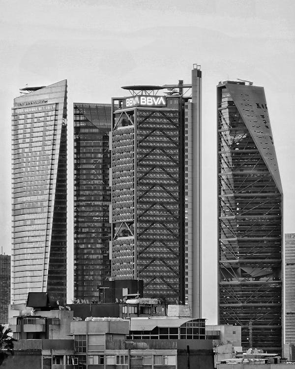 Black and white photo of tall buildings in the city