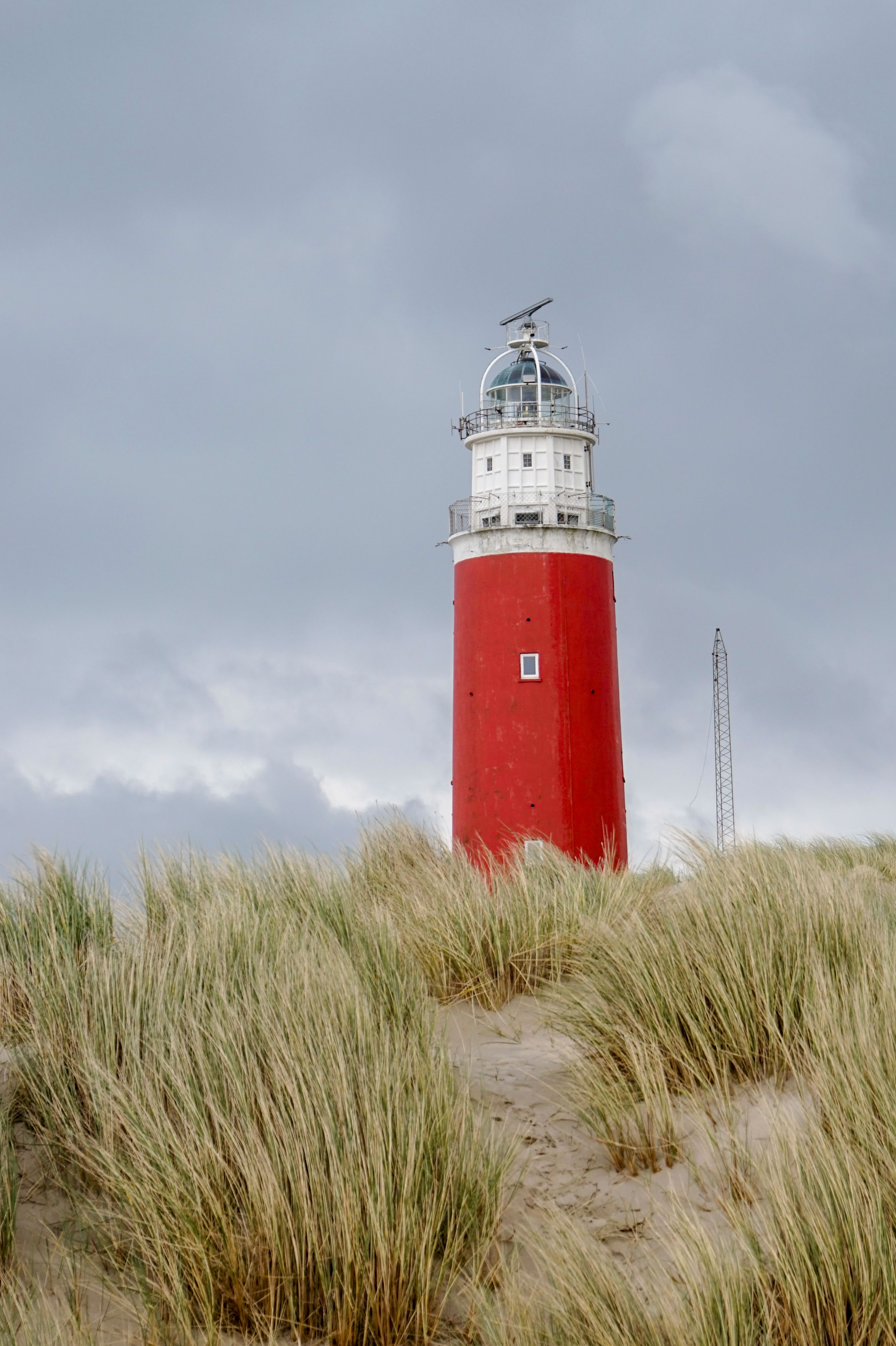 The red Texel lighthouse above the dunes