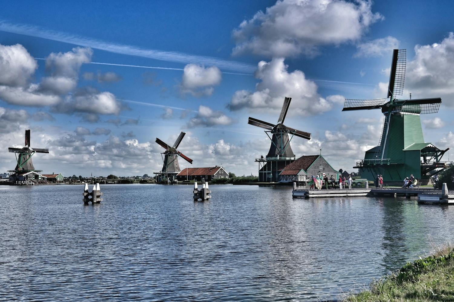 Picturesque windmills and reflections in water at Zaanse Schans
