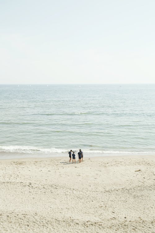 免費 站在海邊的人 圖庫相片