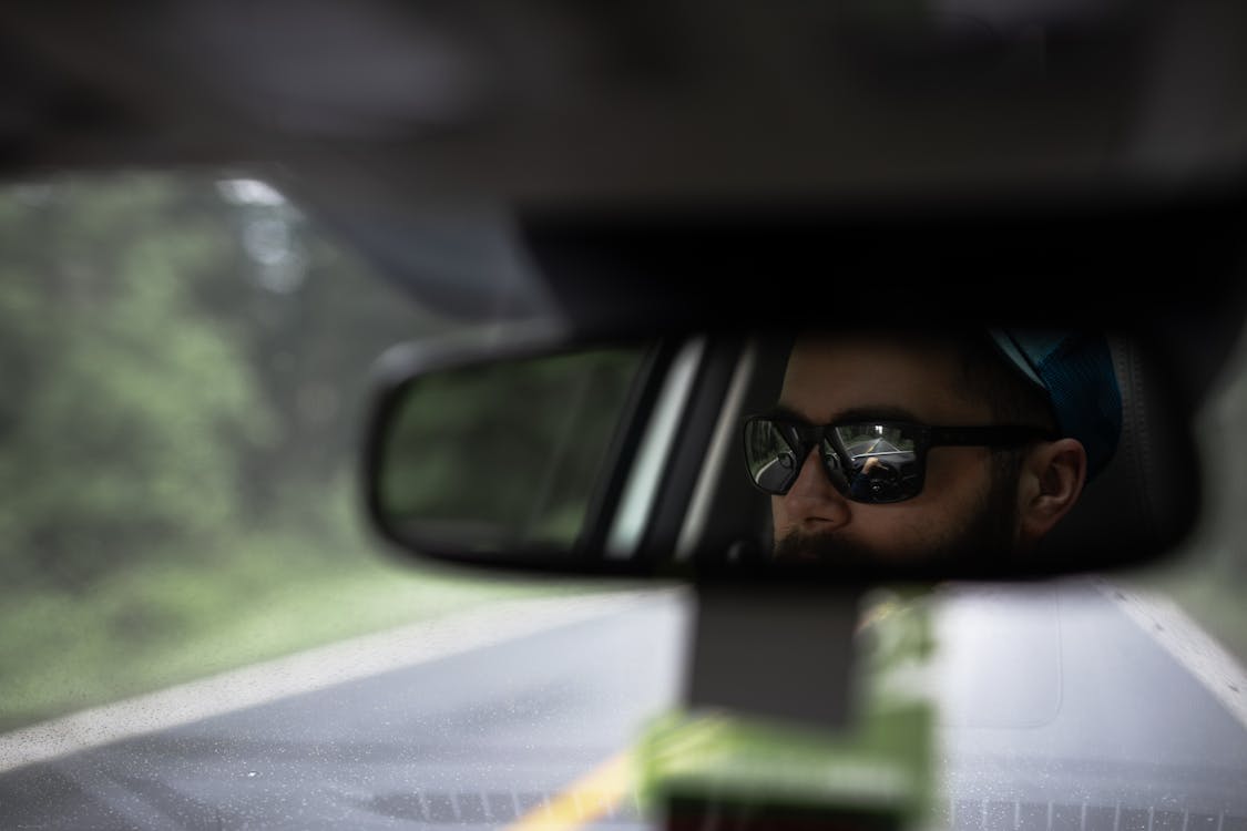 Free Reflection Of A Man On Rear View Mirror  Stock Photo