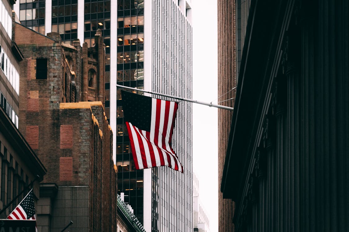 Free Us Flag Outside A Building Stock Photo