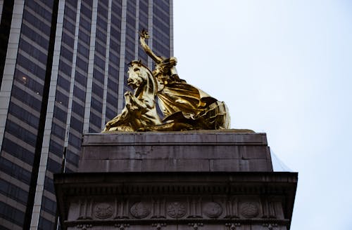 A Monument In Front Of A Building