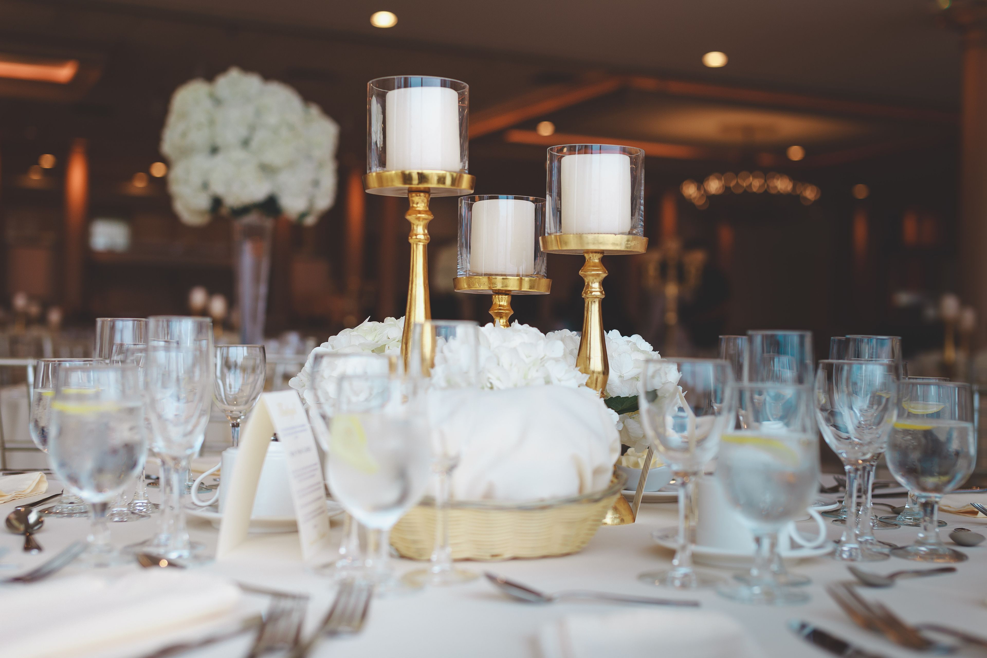 The hall set with long tables for dinner