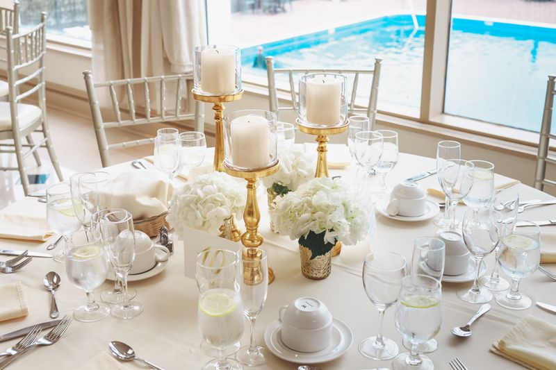 Florist arranging wedding flowers