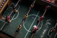 Close-up and Top Photography of Football Table