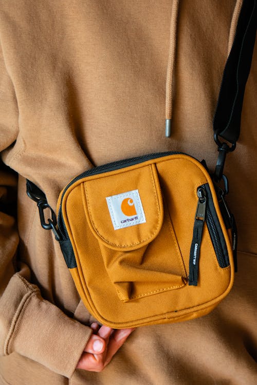Безкоштовне стокове фото на тему «апельсин, багаж, гаманець»