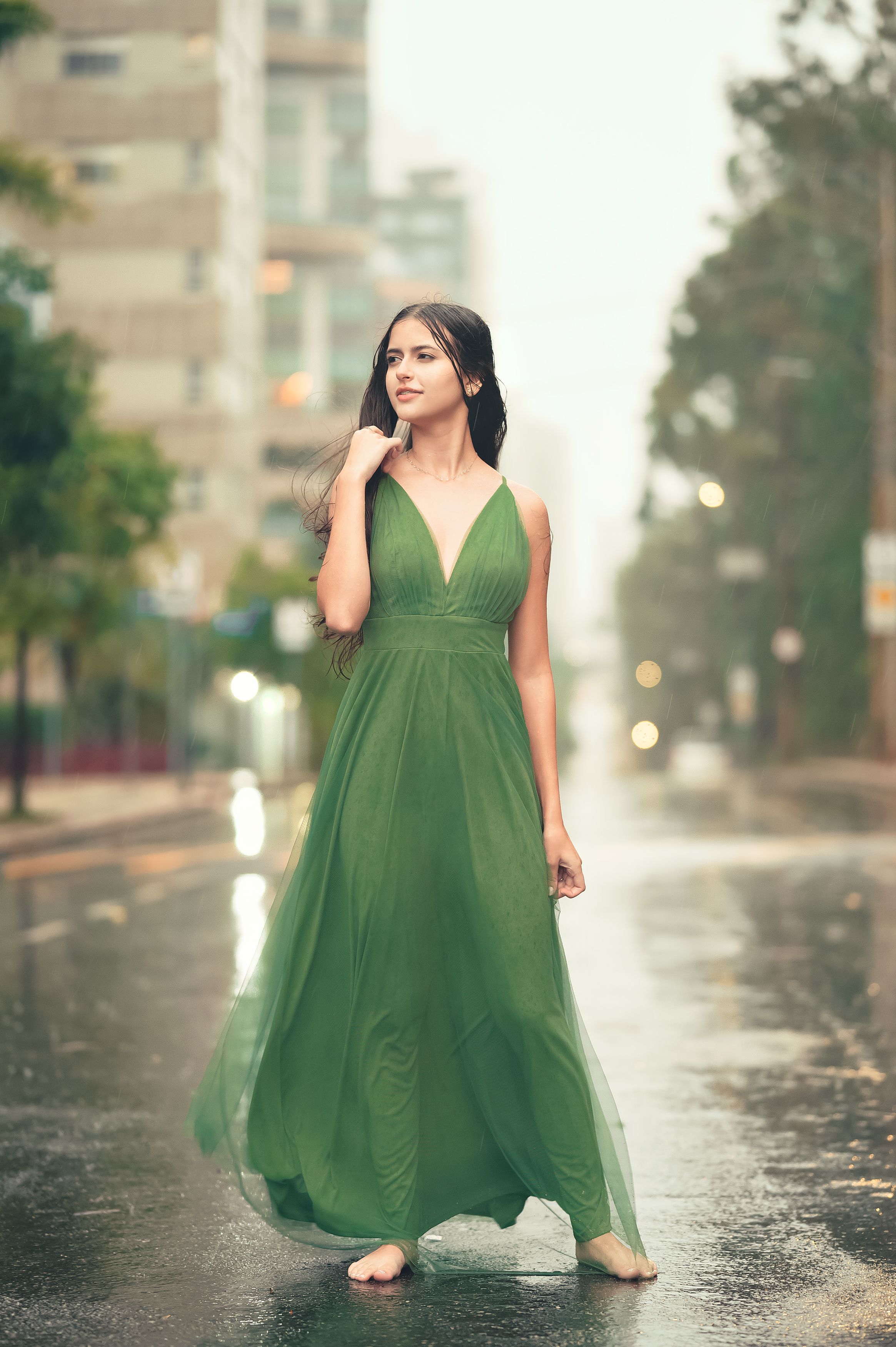 Woman in Green Dress on Street in Rain · Free Stock Photo