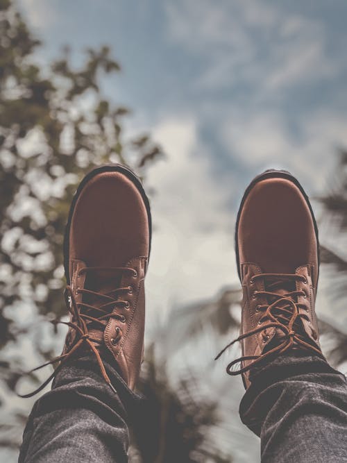 Free Person Wearing Brown Leather Boots Stock Photo