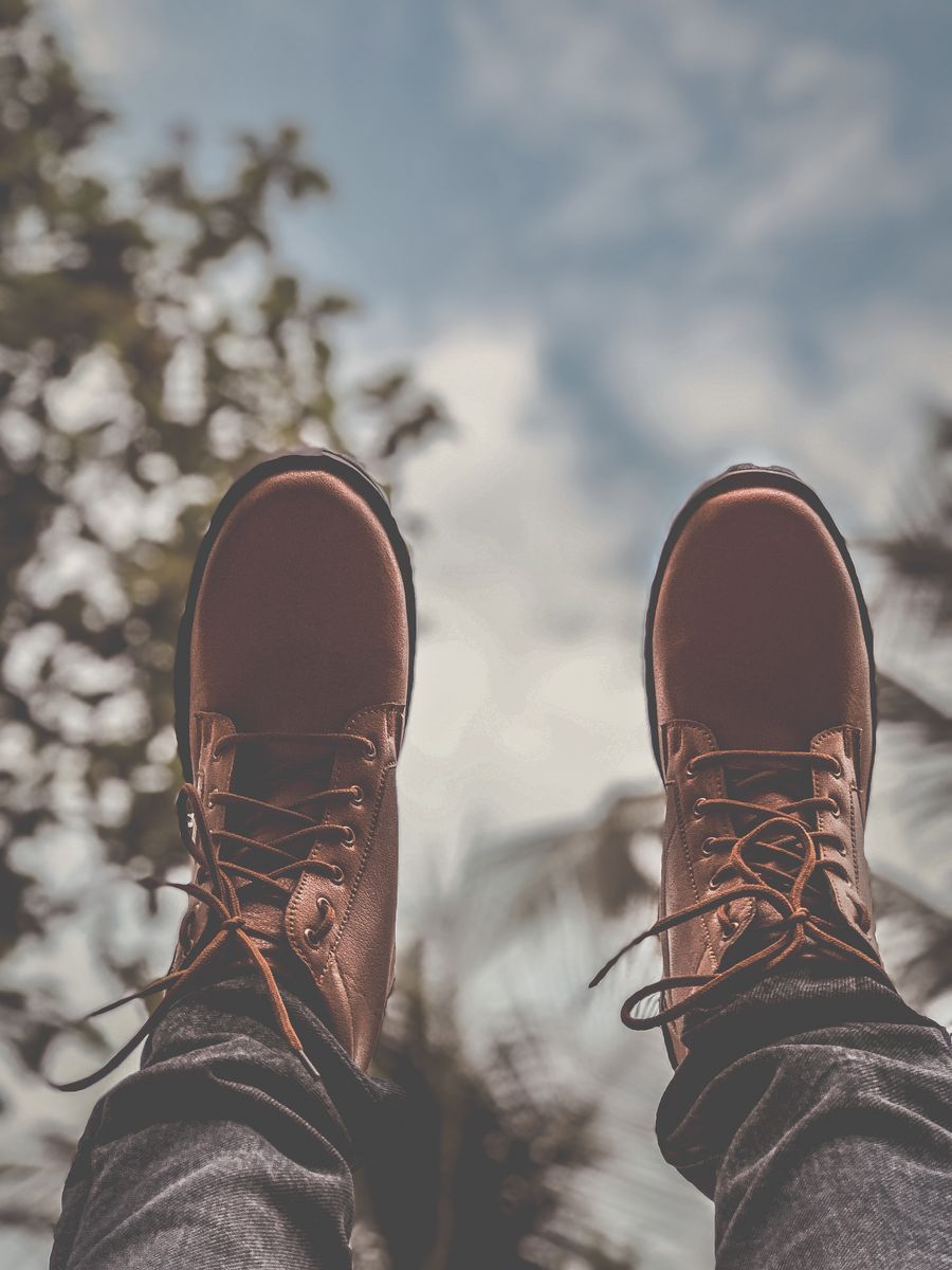 Brown leather Chelsea boots worn with jeans