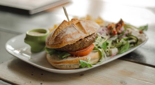 Selective Focus Photography of Cooked Foods on White Ceramic Plate