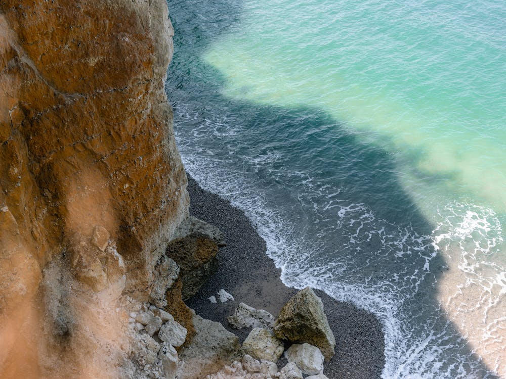 Free Shadow Of Cliff On Shore Stock Photo