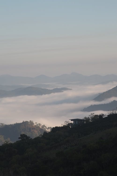 A view of the mountains and fog in the distance