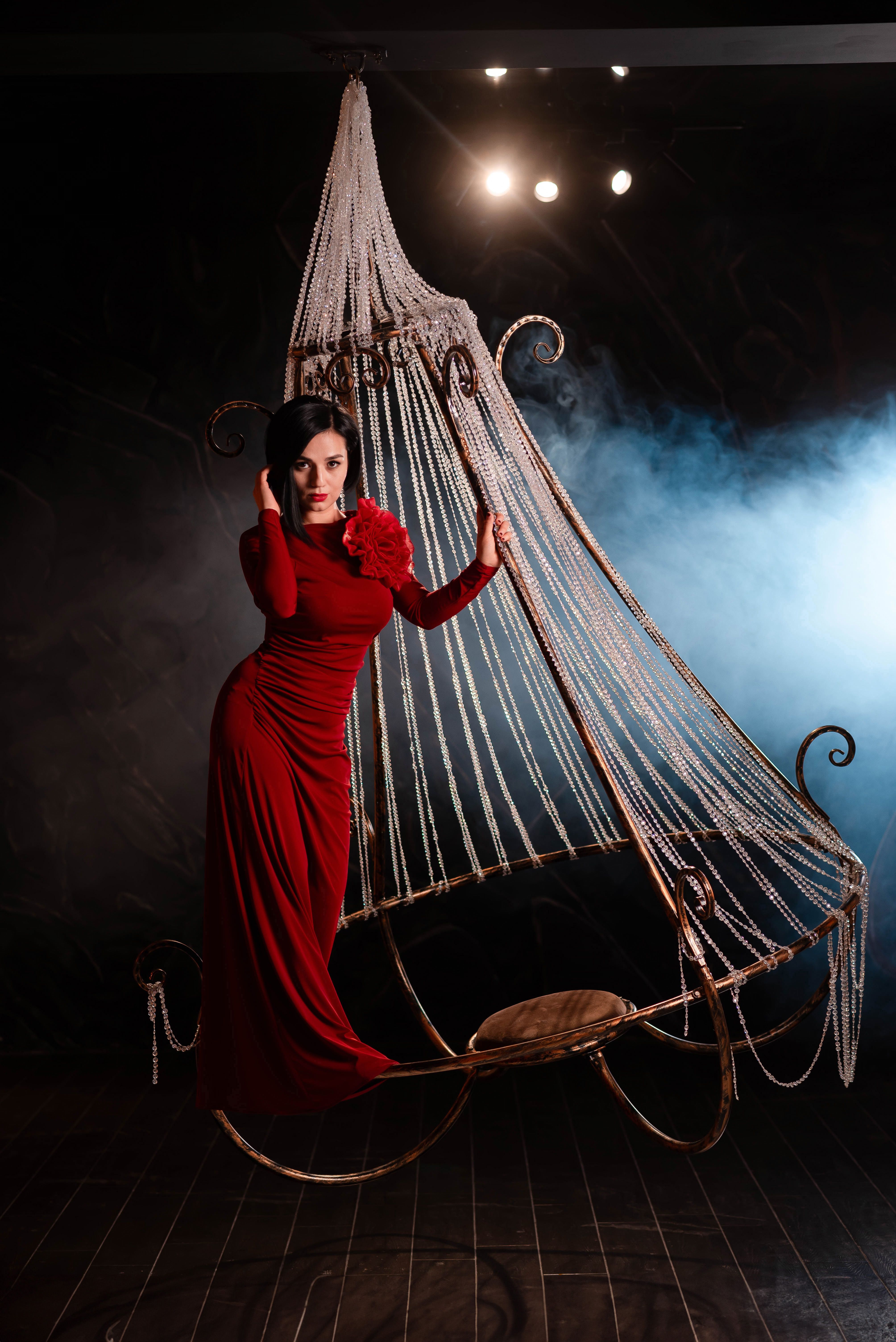 Elegant Woman Posing in a Red Dress · Free Stock Photo